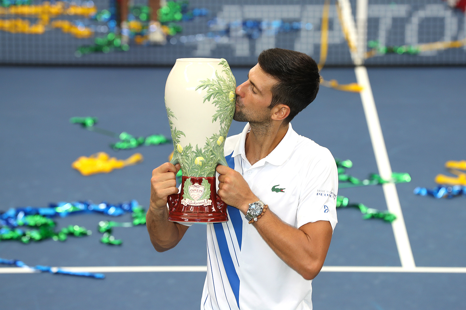 Novak kissing the trophy